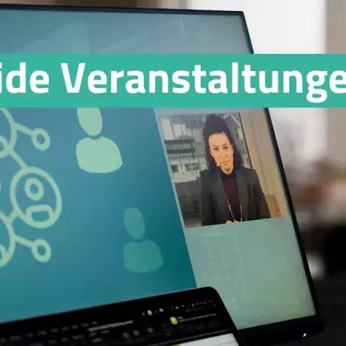 Bildschirm mit Grafik und Kamerabild von Sprecherin